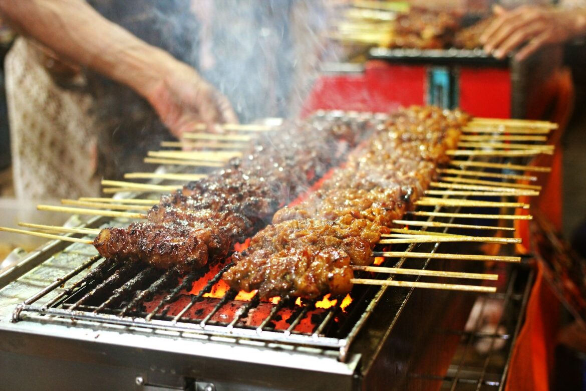 grilled meat on charcoal grill